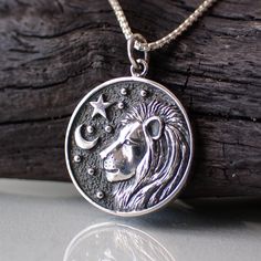 "Leo: The Lion Dates: July 23 - August 22 Element: Fire Modality: Fixed Ruler: Sun   Positives: Passionate | Humorous | Creative   Negatives: Arrogant | Lazy | Self Centered      This recycled sterling silver♻️ necklace is double sided. One side shows the virgin and the other shows the symbol for Mercury which is Virgo's planetary ruler. It measures 5/8\" in diameter. It comes on a 1mm rounded box chain in your choice of 16\", 18\", 20\" or 24\" long." Celestial Style Engraved Pendant Jewelry, Zodiac Sign Sterling Silver Pendant, Sterling Silver Zodiac Sign Pendant, Sterling Silver Zodiac Pendant Jewelry, Spiritual Sterling Silver Medallion Jewelry, Nickel-free Symbolic Sterling Silver Necklace, Sterling Silver Zodiac Jewelry In White Gold, Celestial Pendant Necklace Stamped 925, Celestial Sterling Silver Charms Jewelry