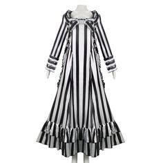 a black and white striped dress on a mannequin