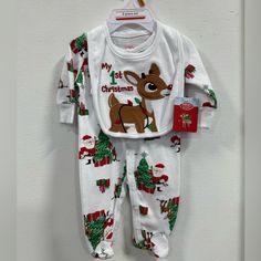 Rudolph Onesie And Bib Set Unisex Outfit Soft Material Newborn Size New With Tags, Never Been Worn White Holiday Playtime Sets, Playful White Christmas Sets, Cute Christmas Playtime Sets, Playful White Sets For Festive Occasions, Cute White Sets For Festive Occasions, Playful White Holiday Sets, Newborn Sleeper, Red Nose Reindeer, Halloween Onesie