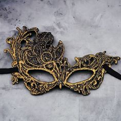 Gold Lace Masquerade Mask - Brand New! Description: Indulge In The Allure Of Our Black Lace Masquerade Mask, A Captivating Accent For Enchanting Occasions. Delicately Lightweight And Featuring An Elegant Tie-Back Design, This Mask Measures 8.3 Inches In Length And 4.7 Inches In Width. Elevate Your Style With This Exquisite Accessory. Details: - Handcrafted Masquerade Mask Measures 8.3 Inches In Length And 4.7 Inches In Width - Ties Securely Behind The Head For A Comfortable Fit Perfect For Mardi Vintage Masquerade Mask For Carnival Party, Black Masquerade Mask For Party And Festivals, Black Masquerade Mask For Party Festivals, Lace Masquerade Mask, Lace Masquerade Masks, Mardi Gras Party, Masquerade Party, Masquerade Mask, Gold Lace