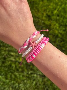 Cute Pink starfish bracelet set! These bracelets are sold in a set of 4, as shown in the pictures! These bracelets are made with wax string, seed beads and a starfish bead!  LINK OUR SHOP: aestheticdaisiesco.etsy.com Sizing Chart  6.25: X-Small (Younger Kids) INCHES 6.5: Small (Kids/Teen Sizing) INCHES 7: Medium (Average Size for Women's) INCHES 7.5: Large INCHES MAKE SURE TO MEASURE! THE SIZING CHART IS FOR A SNUG FIT! *IF YOU WANT A SIZE NOT LISTED LET US KNOW IN THE PERSONALIZATION BOX*  Packaging Our packaging is great for gifting and it comes in an elegant mesh bag! If you have any question please message us! :) Wax String Bracelets, Bracelets Pura Vida, Italian Minimalism, Pink Bracelets, Pink Starfish, Bracelets Summer, Bracelets Trendy, String Bracelets, Starfish Bracelet