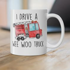 a coffee mug that says i drive a wee woo truck