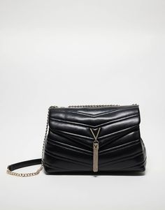 Accessories by Valentino Bags Practical and polished Quilted design Chain shoulder strap Logo plaque Tassel detail Fold-over flap top Press-stud fastening Quilted Shoulder Bag, Trainer Heels, Leggings Sale, Valentino Bags, White Trainers, Hoodies For Sale, Vans Old Skool, Jeans For Sale, Converse Chuck