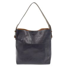 Equally timeless and modern, our best-selling classic hobo is made in rich vegan leather in beautiful colors always accented with neutral straps. This roomy bag accented with a large front pocket and a snap-in removable crossbody, has plenty of room to carry your needs in style. Product Details Main Bag Dimensions: 12 in. H x 14 in. W x 6 in. D Adjustable strap drop: 6-11 in.Magnetic snap top closure Exterior open pocket Two snaps to attach insert to act as lining Brass plated hardware 100% Vega Goats Milk Lotion, Nickel And Suede, School Collection, Fall Transition, Athleisure Wear, Emergency Kit, Dress Hats, Hobo Bag, Front Pocket