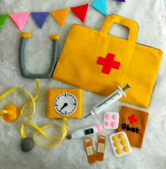 an assortment of medical supplies laid out on a bed