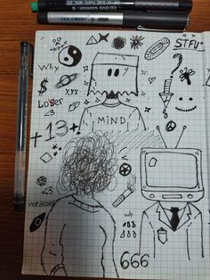 a notebook with some drawings on it