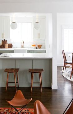 the kitchen is clean and ready to be used as a breakfast nook or bar