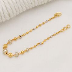 Please click -- Learn more about this item -- below for a full description 22k gold chain bracelet chain handmade jewelry made in India 22k yellow gold chain bracelet handmade jewelry for women Pretty gift for women, Indian gold 22kt jewelry Christmas Present  length is 7 Inch approx.  width is 6/2.5 millimeter approx.   weight is 6.15 grams approx. please message me if you have any query. 22k Gold Bracelet, 22k Gold Chain, Gold Chain Bracelet, Ancient Designs, Hippie Bracelets, Gold Armband, Bracelet Chain, Jewelry Christmas, Gold Bracelet Chain