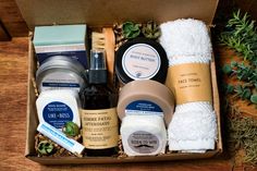 an open box containing various items including soap, lotion, and hand creams