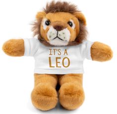 a stuffed lion wearing a t - shirt that says it's a leo on its chest