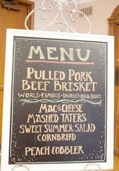 a menu sign is displayed on a table