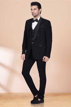 Indulge in luxury with our TUXEDO-M42-S85. Adorned with intricate cutdana and black pearl detailing, this premium piece exudes sophistication and elegance. Perfect for any special occasion, it will elevate your style to new heights. Embrace the finer things in life with our TUXEDO-M42-S85. Black Party Wear Tuxedo For Evening, Black Tuxedo For Evening Party Wear, Black Tuxedo For Evening Party, Luxury Sets For Black-tie Festive Events, Luxury Festive Sets For Black-tie Events, Black Evening Party Wear Suits, Black Party Wear Suits For Evening, Embellished Elegant Tuxedo For Formal Occasions, Elegant Embellished Tuxedo For Formal Occasions