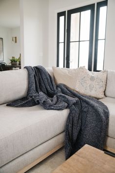 a couch with a blanket on top of it