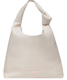 Vince Camuto Fragrance Slouchy Bag This Vince Camuto shoulder bag exudes style and class. The supple faux leather exterior is neutral in color, making it easy to pair with any outfit. Whether you are running errands or going out for a night on the town, this chic tote bag will be your go-to accessory! Color: Beige Outer Material: Pebbled vegan leather Lining: no lining, no pockets, faux suede inside Knot accent on strap Gold-tone hardware Vince Camuto signature logo plaque at front Open top Interior Vince Camuto fabric label Approx. Measurements: 13.5" W x 8.5" H x 3.5" D Brand New With Tags Original sealed manufacturer’s packaging Limited Edition Made exclusively for Vince Camuto Fragrance Collection Guaranteed authentic Vince Camuto Bag is collapsed for shipping Gift with purchase The it Vince Camuto Bag, Slouchy Bag, Stylish Tote Bag, Fabric Labels, Beige Style, Leather Items, Vince Camuto, Leather Tote, Faux Suede