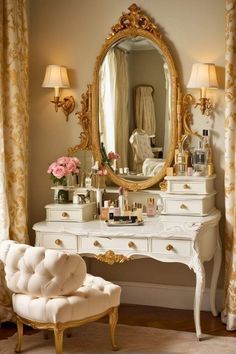 a white dressing table with a mirror and chair