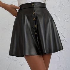 Elevate your everyday look with this chic High Waist Faux Leather A-Line Skirt, designed for the modern woman on the go. Perfect for commuting or casual outings, this versatile skirt combines sleek style with practical elegance. The front middle fastener decoration adds a unique and edgy element to the classic A-line silhouette, creating a standout piece that effortlessly blends fashion and function.Crafted from high-quality faux leather, this skirt offers a smooth, luxurious finish that looks and feels just like the real thing. Its high waist design cinches the waist, enhancing your natural shape and providing a flattering, feminine fit. The A-line cut ensures ease of movement, while the structured shape gives it a sophisticated look, making it ideal for both casual and semi-formal occasi Leather A Line Skirt, Button Front Skirt, Solid Skirt, Aline Skirt, Spring Skirts, Faux Leather Skirt, Leather Pattern, Button Dress, Sleek Fashion