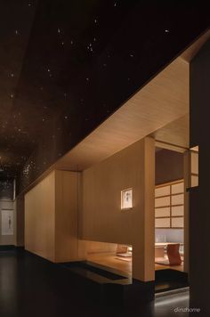 an empty room is lit up with stars above the bed and below it are lights