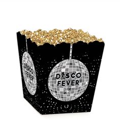 a black and white box with disco fever on the front, gold glitter around it