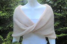 Ivory shawl, Winter wedding shawl, Bridal cape, Bridal wrap, Bridal shrug, Bridal shawl, Romantic wedding shawl, Wedding bolero, Mohair cape, Romantic wedding shawls and boleros, wedding shawl for bride and bridesmaids, White capes, Bridal wrap for winter wedding, Knit shawl, Knit wedding cape, Knit cape wrap sweater, Knitted shawl for wedding dress, Shawls and wraps This shawl is handcrafted and designed to be the perfect addition to any bridal dress and makes a wonderful gift. Perfect for laye Wedding Knit, Shawl For Wedding, Bridal Capes, Winter Wedding Shawl, Cape Wrap, Bridal Shrug, Hand Knit Shawl, Bolero Wedding, Knitted Shawl