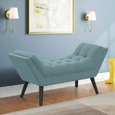 a blue chaise lounge chair in a living room