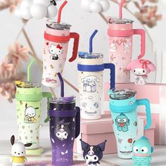 the hello kitty tumblers are all lined up