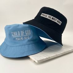 Our Child of God bucket hats are reversible and beautifully embroidered. The baby blue side of this hat features "Child of God", but flip it inside out for a black bucket hat that features "Praise The Most High". Easily pair this hat with your wardrobe and enjoy for the upcoming spring and summer months! *choose from 2 sizes: regular (58 cm) and large (60 cm) Adjustable Blue Bucket Hat, Blue Reversible Bucket Hat, Black Bucket Hat With Letter Print, Letter Print Bucket Hat, African Shoes, Black Bucket Hat, Reversible Bucket Hat, Black Bucket, Child Of God