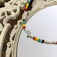 This Colorful Beaded Necklace With Happy Face is the perfect item for your summer look!Material: BeadsColor: Picture ColorMeasurement:Length: 17" + 2" Smiley Necklace, Colorful Beaded Necklace, Necklace Y2k, Y2k Necklace, Y2k Jewelry, Seed Bead Necklace, Face Design, Happy Face, Bead Designs