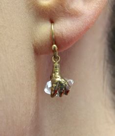 "A bird claw holding a gem, or anything else really, was a favorite theme in the 19th century given the Victorian fascination with the natural world. We cast the mounting for these Herkimer-diamond earrings in 10k recycled gold from one of my favorite Victorian forms, and added a 10k antique style earwire so they can dangle freely to catch the light. Rustic-glam and lightweight enough for every day wear; perfect for dressing up or down. Approximately 1\" from top curve of wire to bottom of drop Brass Claw Jewelry As Gift, Formal Antique Hand Cast Jewelry, Antique Hand Cast Jewelry For Formal Occasions, Hand Cast Brass Dangle Jewelry, Herkimer Diamond Earrings, Rustic Glam, Herkimer Diamond, Recycled Gold, Raw Crystal