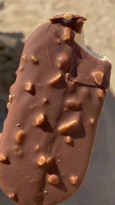 an ice cream popsicle with chocolate sprinkles