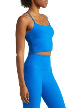 Cropped, but not short on comfort, this racerback tank is made from four-way-stretch performance fabric with an ultrasoft feel and quick-drying capabilities. 15"  regular length (size Medium) 16" plus length (size 3X) Scooped neck Racerback Built-in shelf bra Moisture-wicking fabric dries quickly to keep you cool and comfortable 87% polyester, 13% spandex Machine wash, tumble dry Made in the USA of imported fabric Women's Active & Swim Summer Moisture-wicking T-back Activewear, Summer 4-way Stretch Racerback Sports Bra, Functional Blue Racerback Tank Top, Summer Sports Bra With 4-way Stretch And Racerback, Blue Racerback Tops For Pilates, Yoga Tank Top T-back, Sports Top With Medium Support And Scoop Back, Sports Tops With Medium Support And Scoop Back, Yoga T-back Tank Top