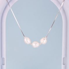 This stunning necklace features lustrous freshwater baroque pearls set on a delicate sterling silver chain. Elevate any outfit with its effortless elegance and timeless beauty. The perfect accessory to add a touch of sophistication and refinement to your ensemble. Indulge in the luxurious allure of baroque pearls and sterling silver. Materials: Freshwater pearls, 925 sterling silverChain length: 17.5 in Jewelry Care: See more information about how to care for your jewelry here. Shipping Policy: Pearl White Sterling Silver Pearl Chain Necklace, Pearl White Sterling Silver Necklace With Pearl Chain, Sterling Silver Pearl Chain Necklace In Pearl White, Sterling Silver Necklace With Pearl Chain In Pearl White, Silver Pearl Necklace With Delicate Chain, Minimalist Silver Necklace With Baroque Pearl, Dainty Silver Baroque Pearl Necklace, Dainty Silver Baroque Pearl Necklaces, Minimalist Silver Baroque Pearl Necklace