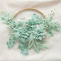 a close up of a hoop with flowers on it