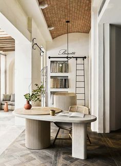 a living room filled with furniture and decor