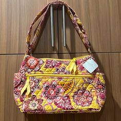 On The Go Bali Gold Adjustable Strap Yellow Double Handle Shoulder Bag For Travel, Yellow Travel Bags For Spring, Yellow Shoulder Bag For Spring Travel, Vera Bradley Laptop Case, Purple Floral Top, Vera Bradley Disney, Purple Punch, Floral Backpack, Vera Bradley Bag