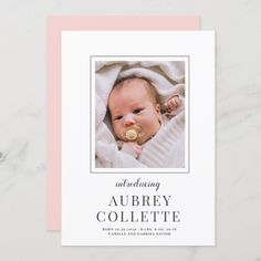 a birth announcement card with a photo of a baby