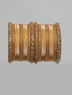 These fancy metal matte finish bangles are a perfect accessory for any of your Indian outfits Traditional Indian Jewelry:Slight Color variations are possible due to lighting and photography. If you are interested in purchasing this item and have any additional questions about this item, please feel free to email us at nazranaanj@gmail.com. For faster responses, call us at 732-283-1808 or WhatsApp us at 609-852-9922 Care instructionsKeep Jewelry away from direct heat, water, perfumes, deodorants Rose Gold Metal Bangle For Wedding, Festive Metal Bangle For Parties, Festive Gold Metal Bangle, Gold Bollywood Bangle For Parties, Outfits Traditional, Traditional Indian Jewellery, Expensive Jewelry Luxury, Fancy Stones, Stone Bangle