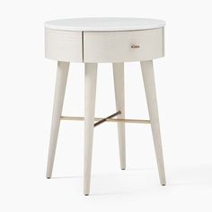 a small white table with two drawers on one side and an open drawer on the other