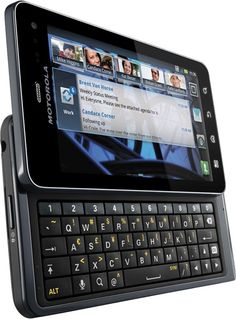 an image of a cell phone with keyboard attached to it's back end and side