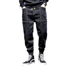 Take your fashion game to the next level with our 2023 Autumn Collection's street dark men's denim joggers! These monochrome, mid-waist joggers are perfect for making a statement, yet still keeping it comfortable and stylish. With their drawstring closure and stretchy fabric, they promise to keep you looking sharp even during the most intense streetwear looks.Why You'll Fall In Love Street Style: Make an impact with these joggers, designed to keep you looking your best no matter the season or oc