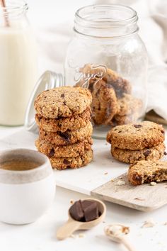 chocolate chip cookies and milk on a table