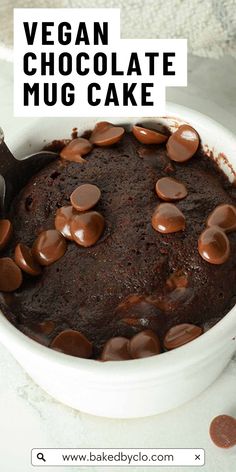 vegan chocolate mug cake in a white bowl on a table with text overlay