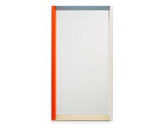 an orange and white framed mirror on a white wall with the reflection of it's light