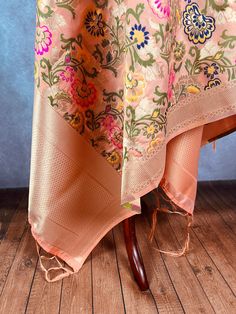 Paithani Style Floral Semi Banarasi Silk Dupatta. Meenakari Work with gold Zari Work. Handloom Dupatta, very light weight and soft. Item: DupattaBase color : Light Peach Fabric : Banarasi Semi Soft Silk (Not Pure Silk)Work : Weaved with tasselsLength of the Dupatta : 88 inches approx.Width of the dupatta : 35inches (Approx.)Please note there are threads on the back side of the dupatta. Store Policies- No return or exchange will be accepted for color variations.- No return or exchange will be acc Luxury Paithani Silk Dupatta For Diwali, Paithani Dupatta, Festive Peach Traditional Wear With Zari Weaving, Peach Dupatta With Zari Work For Festivals, Peach Traditional Wear With Traditional Drape, Festive Peach Traditional Wear, Festive Peach Dupatta With Zari Weaving, Festive Peach Dupatta With Pallu, Peach Traditional Wear With Pallu For Festivals