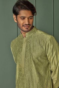 Olive green chanderi kurta with all over floral jaal pattern and tonal resham embroidery. Paired with contrast pyjama. - Aza Fashions Green Bandhgala With Resham Embroidery For Festivals, Festive Green Bandhgala With Resham Embroidery, Green Art Silk Kurta With Dabka, Green Traditional Wear With Intricate Embroidery And Long Sleeves, Transitional Traditional Wear With Resham Embroidery In Pista Green, Traditional Green Bandhgala For Navratri, Transitional Pista Green Traditional Wear With Resham Embroidery, Transitional Season Pista Green Traditional Wear With Resham Embroidery, Green Art Silk Kurta With Dabka Detailing