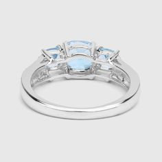 "Blue Topaz Ring, Natural 5 Stone Sky Blue Topaz Cushion Promise Ring, Sterling Silver Ring, December Birthstone Ring Flaunt yourself with this blue & white topaz 3 stone ring. The natural gemstones have a combined weight of 1.98 carats and are set in .925 sterling silver with rhodium plating. The soft blue hue of this ring adds a pop of color to any look! The understated design and vibrant stones make this ring perfect for every occasion. Product Details: Metal: .925 Sterling Silver Gross W Blue White Topaz Ring For Promise, White Gold Three Stone Blue Topaz Ring, Three Stone Blue Topaz Sapphire Promise Ring, Fine Jewelry Blue Topaz Three Stone Ring, Three Stone Topaz Anniversary Ring, Blue Topaz Three Stone Ring For Anniversary, Blue Topaz Three-stone Ring, Three-stone Blue Topaz Ring For Anniversary, Fine Jewelry Topaz Three-stone Ring For Promise