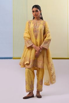 Yellow kurta with peach silk thread, gold dabka, pearl, zari and sequin embroidery in floral pattern. Paired with matching pure silk organza Pakistani salwar adorned with peach silk thread embroidery and mukaish work. Comes with pure silk organza dupatta. - Aza Fashions Organza Shirt, Women Kurta, Dhoti Pants, Yellow Pants, A Line Shorts, Sharara Set, Organza Dupatta, Embroidered Neckline, Kurta With Pants