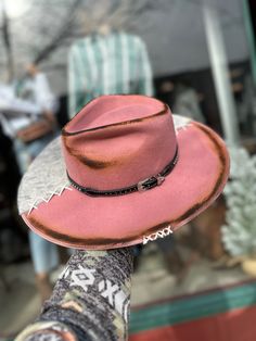 Check out this beautiful custom Outback hat! This hat is a soft pink Outback and is customized with a hat band, custom stitching, genuine cowhide and a burn on the edges of the crown. It is sure to compliment any outfit perfectly! Size L/XL (Has a drawstring inside to be adjustable!) Hat Band Stitching Genuine Cowhide Crown Burn Don't see your size? Call us or stop in to get a custom hat designed for you! This hat design can be recreated to look very similar depending on availability of decorati Pink Bohemian Hat For Rodeo, Pink Western Felt Hat For Rodeo, Pink Adjustable Hat Band For Western-themed Events, Pink Burned Hat, Lover Girl Era, Pink Country-style Hat For Ranch, Outback Hat, Pink Cowboy, Western Store