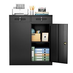 an open cabinet with files and folders on top, next to other office supplies