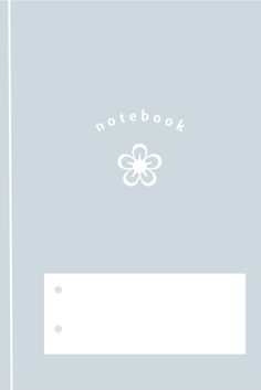 a white notebook with the words notebook written on it and a flower in the middle