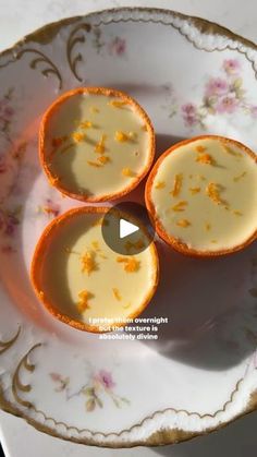 three pieces of dessert sitting on top of a white and gold plate with floral designs